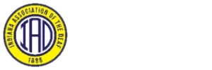 Indiana Association of the Deaf logo featuring large blue letters “IAD” in the center of a circular design. A yellow outer ring with blue text reads “Indiana Association of the Deaf” across the top and sides, with “1886” at the bottom. The logo uses blue and yellow colors.